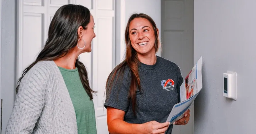 An Infinity comfort advisor walking a homeowner through system options